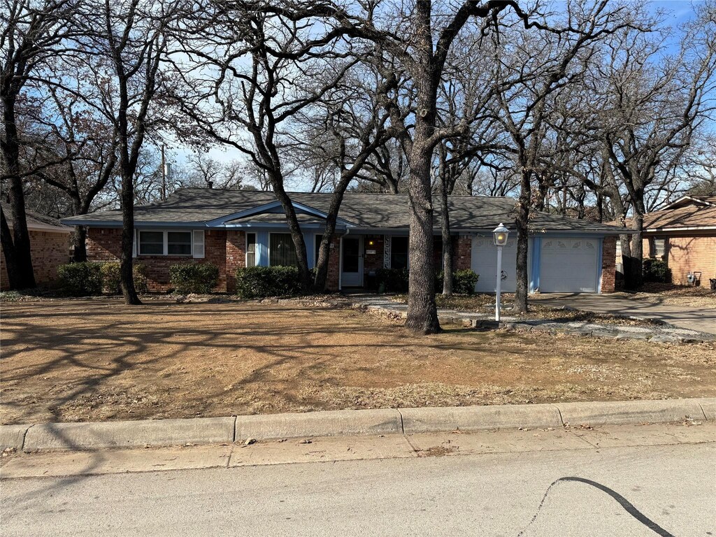 ranch-style house with a garage