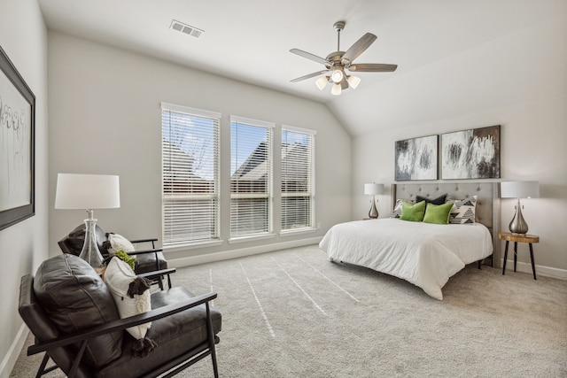 carpeted bedroom with lofted ceiling and ceiling fan