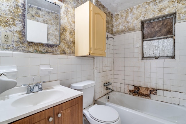 full bathroom featuring toilet, shower / bathing tub combination, tile walls, and vanity