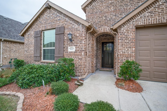 entrance to property with a garage