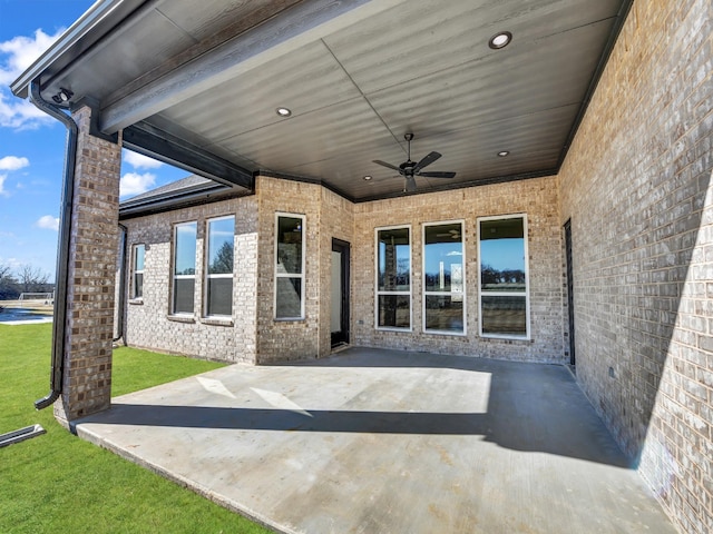 view of patio / terrace featuring ceiling fan