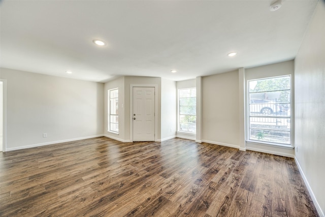 interior space with dark hardwood / wood-style floors