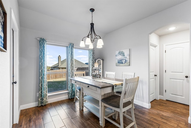 dining room featuring a chandelier and a healthy amount of sunlight