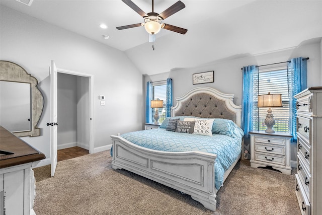 bedroom featuring lofted ceiling, carpet floors, and ceiling fan