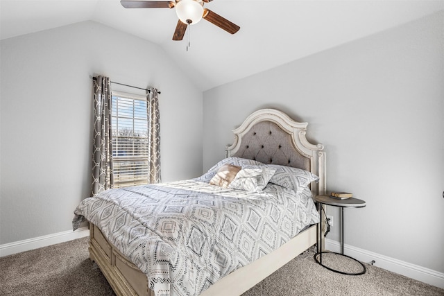 carpeted bedroom featuring ceiling fan and vaulted ceiling