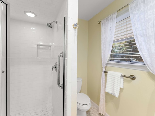 bathroom with toilet and curtained shower