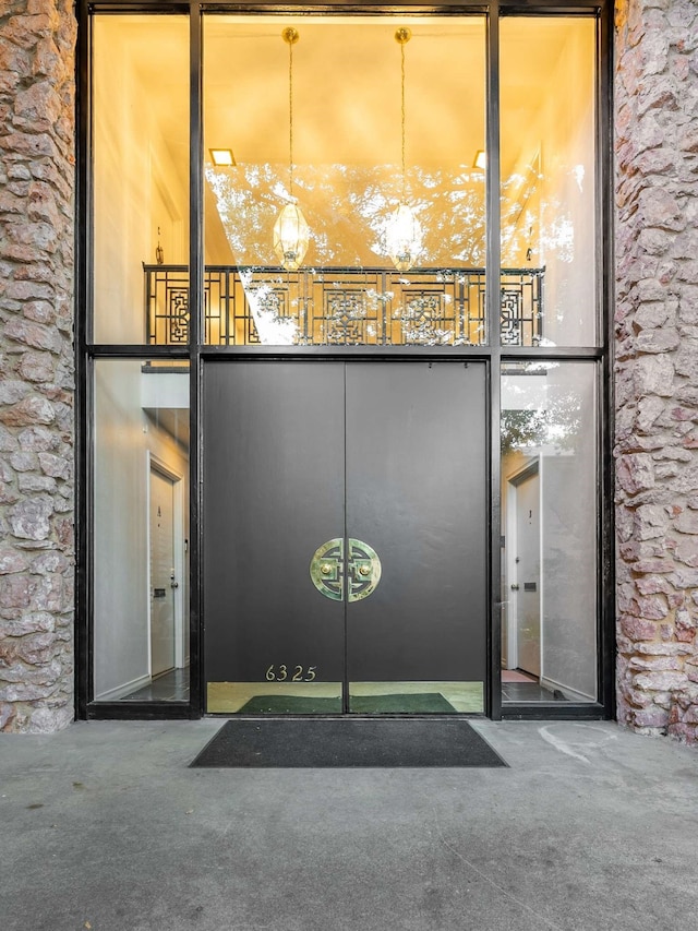 doorway to property with a balcony