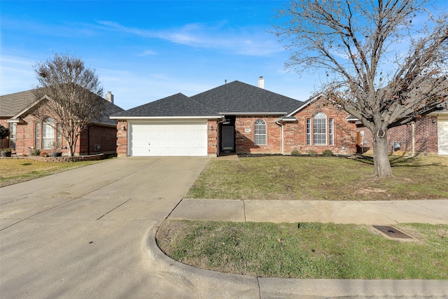 ranch-style home featuring a front yard and a garage