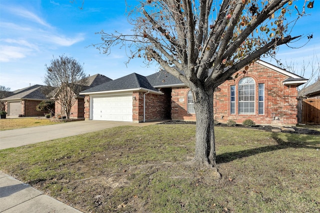 single story home with a front yard and a garage