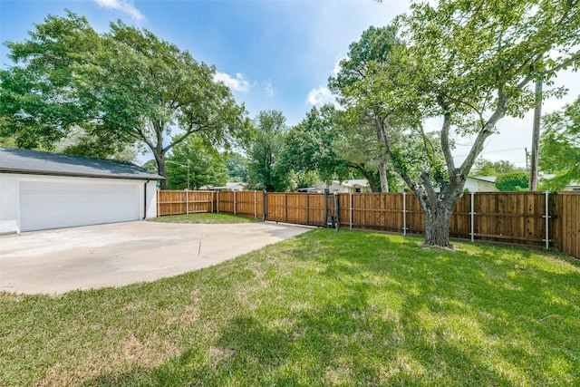 view of yard featuring a garage