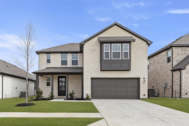 front of property featuring a garage, a front yard, and cooling unit