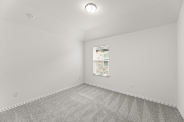 empty room featuring carpet floors