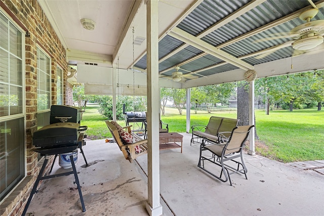 view of patio featuring ceiling fan and area for grilling