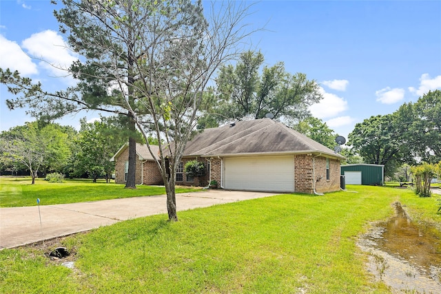 ranch-style house with a garage and a front lawn