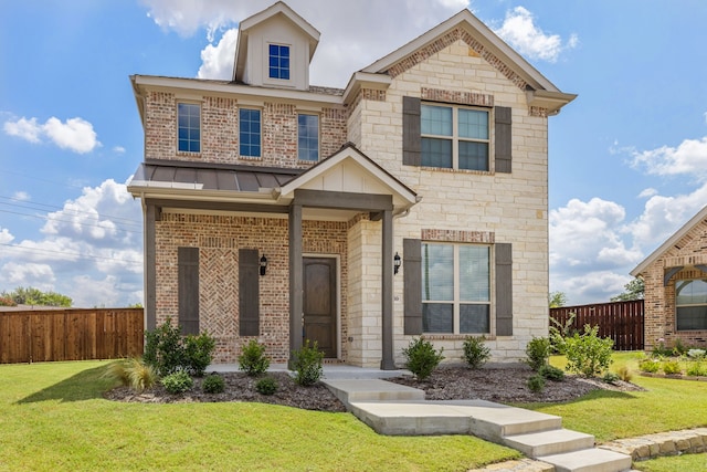 view of front facade featuring a front lawn