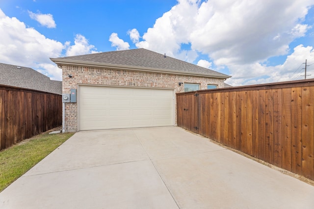 view of property exterior with a garage