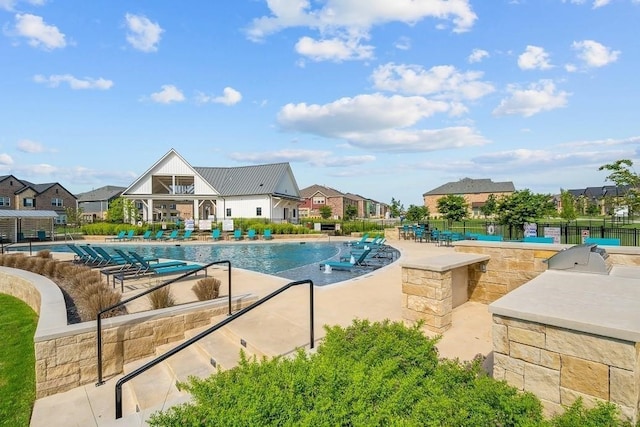 view of pool with a patio