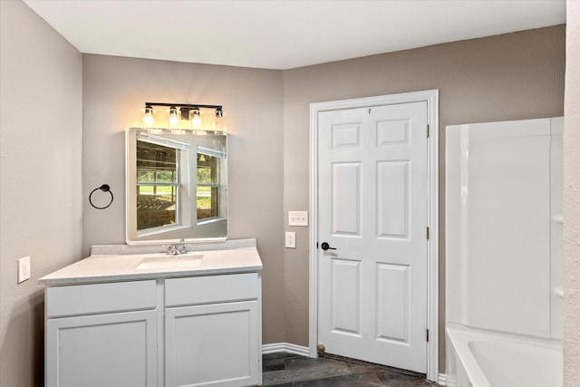 bathroom featuring vanity and hardwood / wood-style flooring