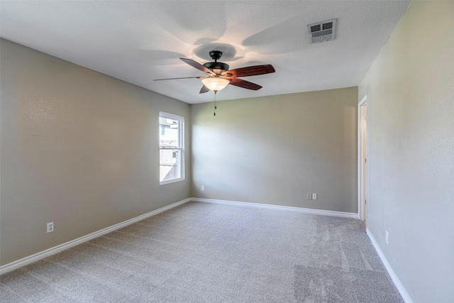 unfurnished room featuring carpet flooring and ceiling fan