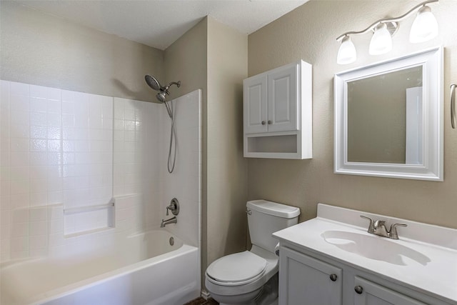 full bathroom featuring toilet, shower / washtub combination, and vanity