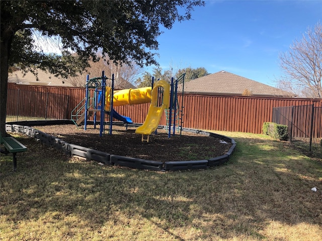 view of playground featuring a yard