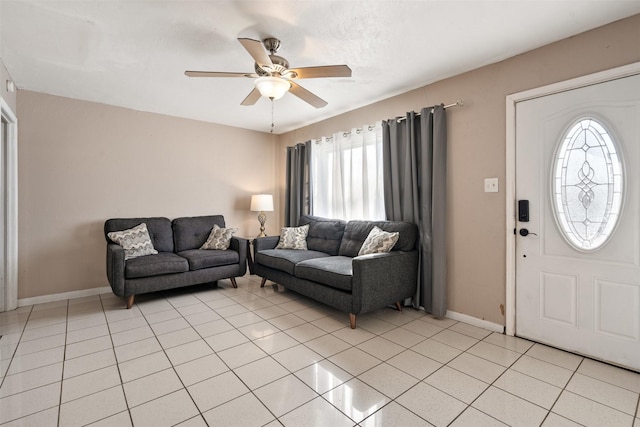 tiled living room with ceiling fan