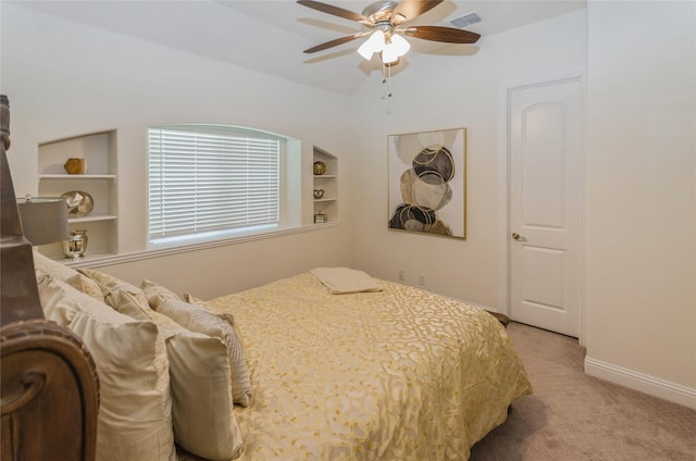 carpeted bedroom featuring ceiling fan and lofted ceiling