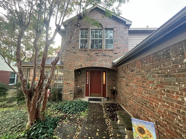 view of front property with a front lawn and a garage