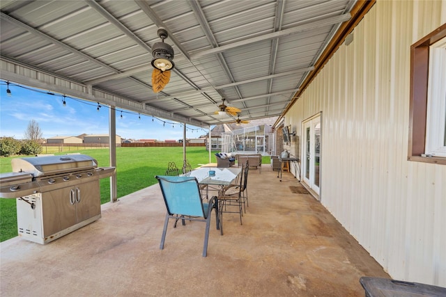 view of patio featuring ceiling fan, a lanai, and grilling area