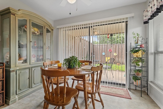 dining room featuring ceiling fan