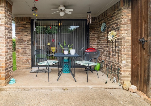 view of patio featuring ceiling fan