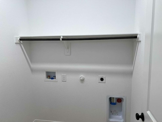 washroom featuring washer hookup, hookup for a gas dryer, and electric dryer hookup