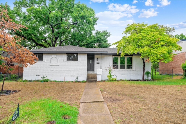 view of front of home with a front lawn