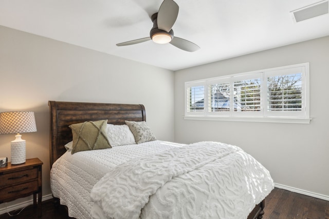 bedroom featuring dark wood-type flooring and ceiling fan