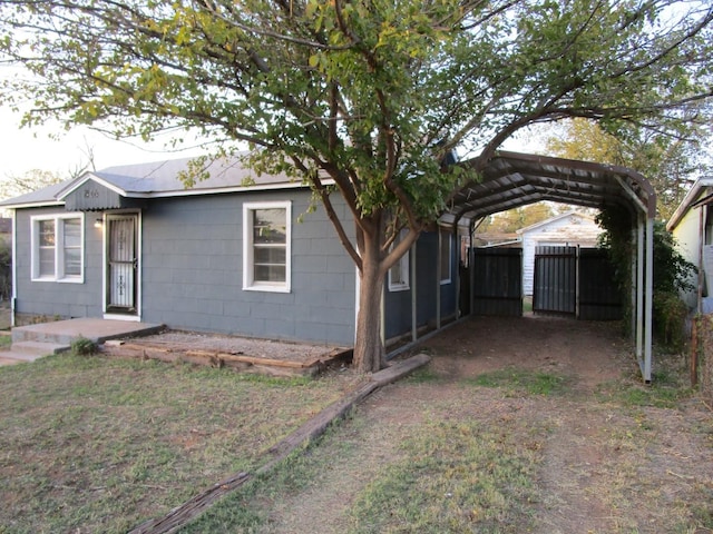 view of front of house featuring a carport