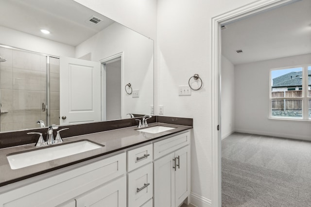 bathroom featuring vanity and walk in shower