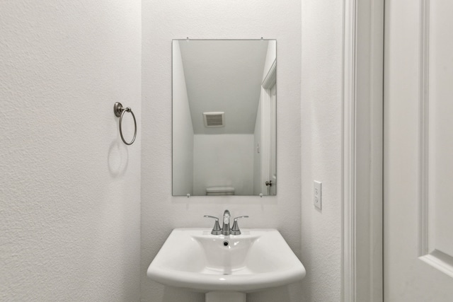 bathroom with sink and toilet