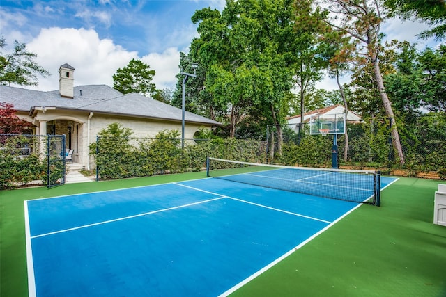 view of tennis court with basketball court