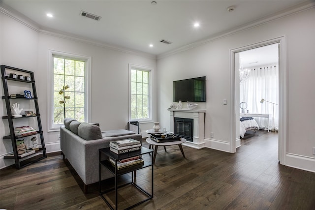 living room featuring crown molding and dark hardwood / wood-style flooring