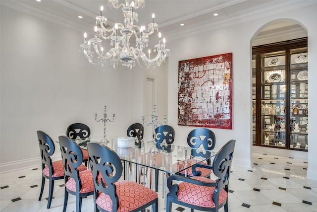 tiled dining room with an inviting chandelier and ornamental molding