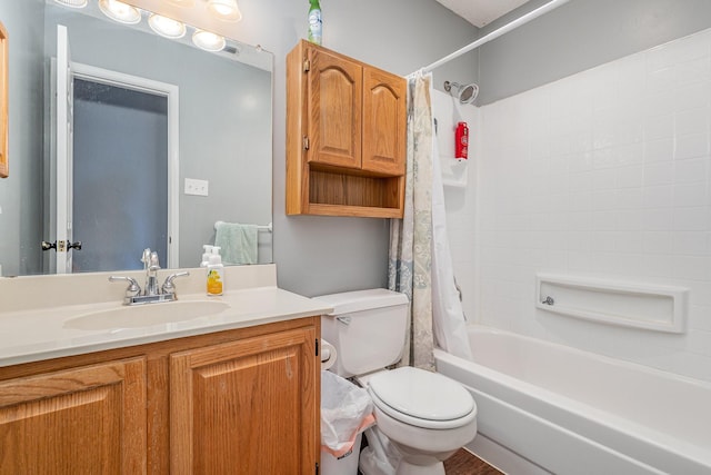 full bathroom featuring toilet, shower / bathtub combination with curtain, and vanity