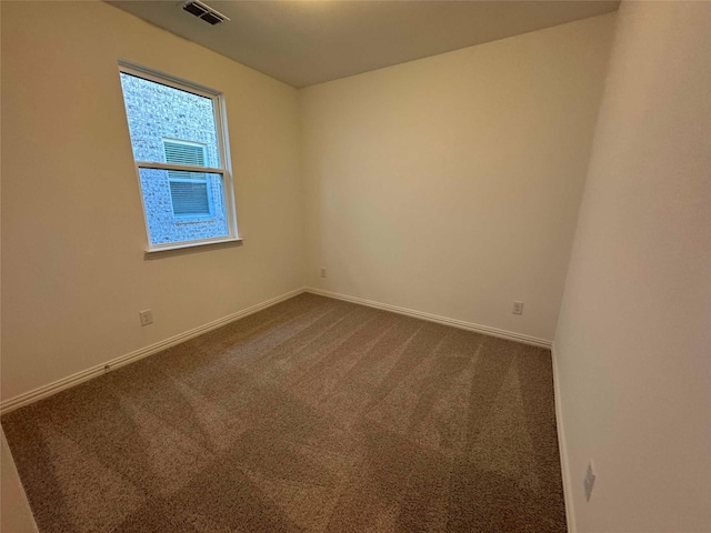 unfurnished room with carpet