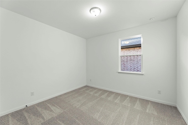 empty room with carpet flooring