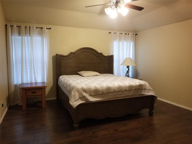 bedroom featuring dark wood-type flooring and ceiling fan