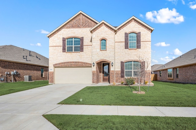 view of front of home with a garage, a front yard, and central AC unit