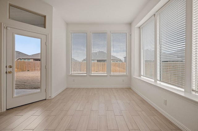 view of unfurnished sunroom