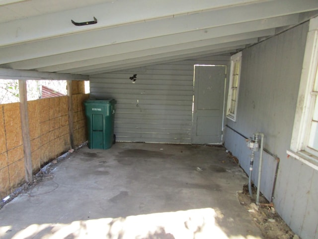 garage with wood walls