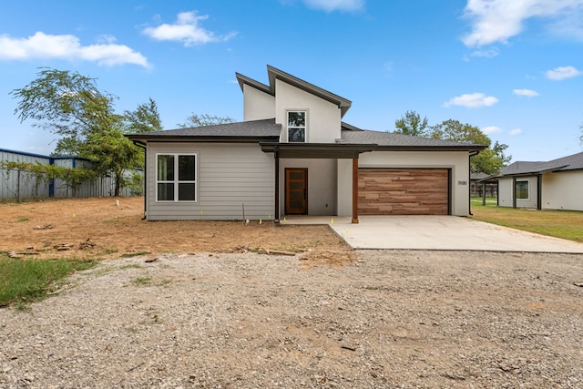 view of front of property featuring a garage