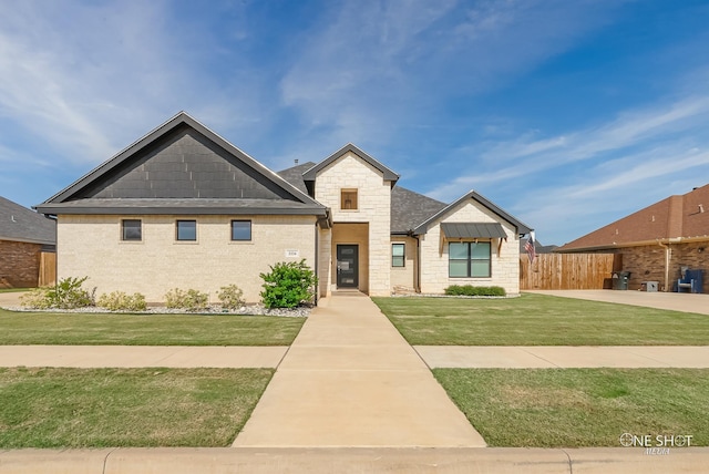 view of front of house with a front lawn