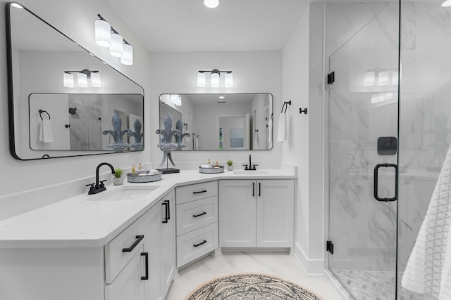 bathroom with an enclosed shower and vanity